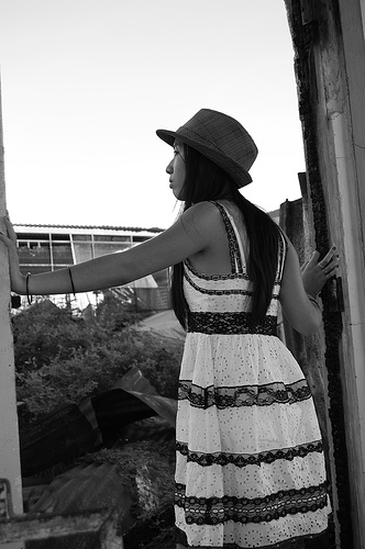 Photograph of girl looking into ruins by Jennifer Kaplan